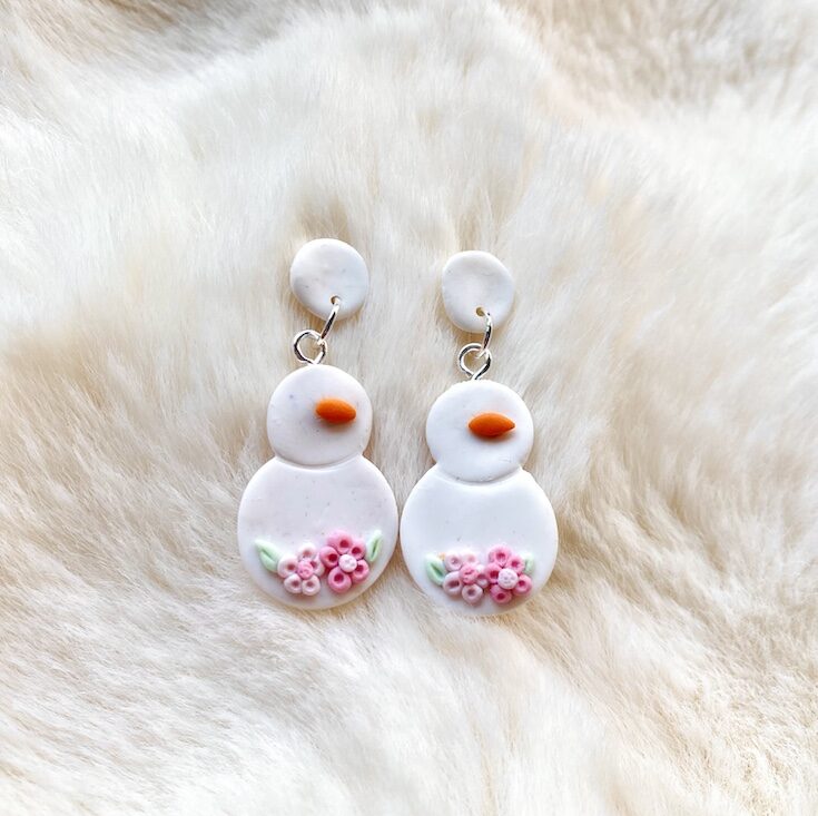 sneeuwmannen roze bloemen