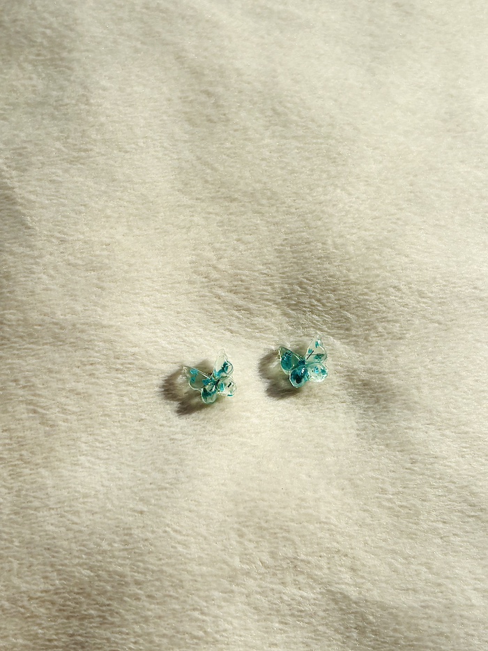 vlindertjes blauw zeegroen bloemetjes